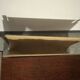 1970s/80s coffee table on casters with metal tubing, light-colored door