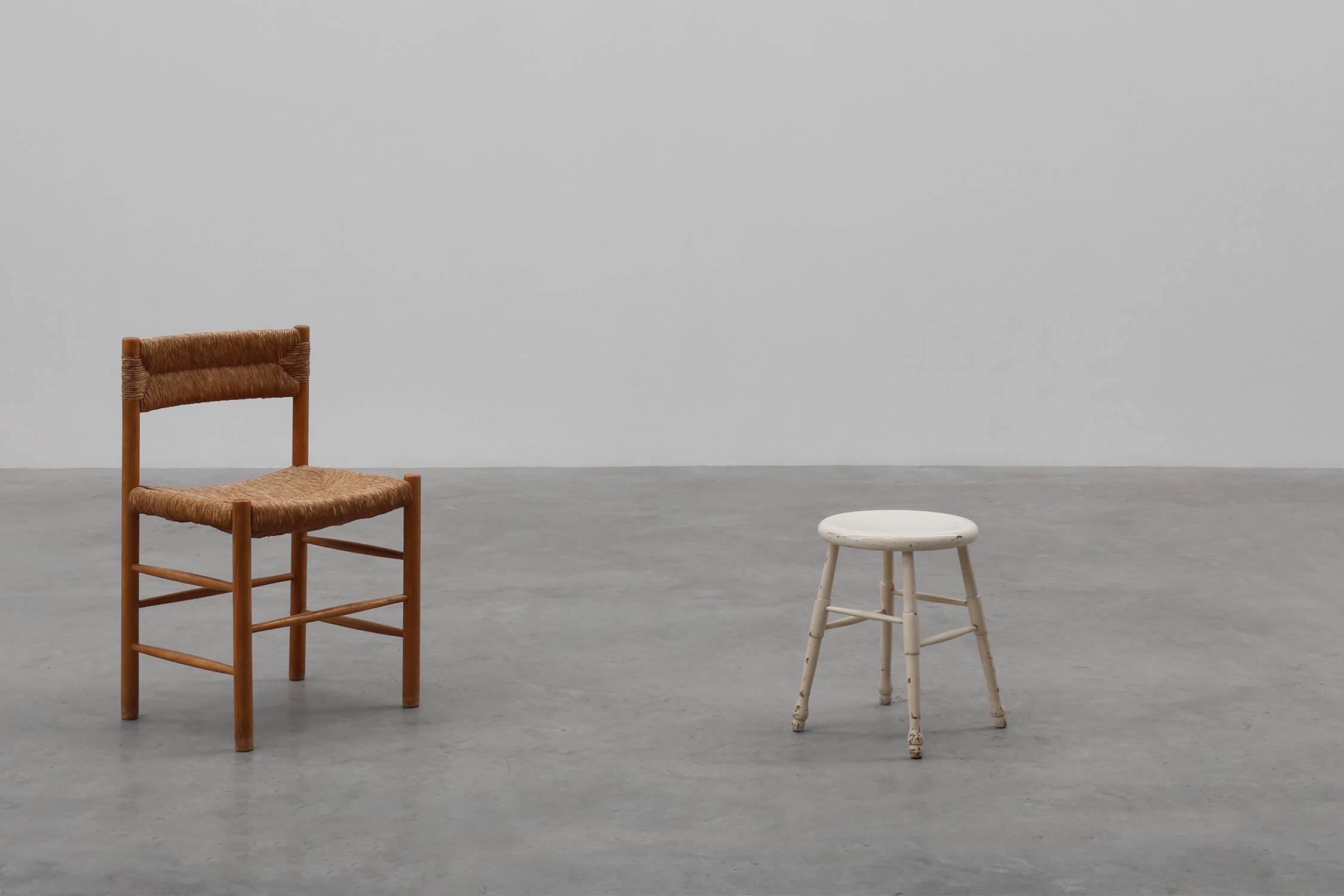 Rustic white wooden low farm stool, France ca. 1920