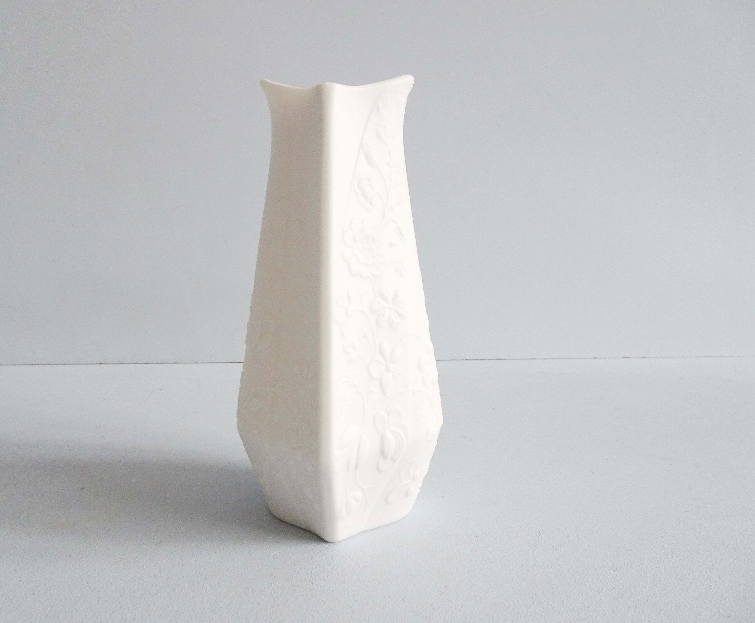 AK Kaiser bisque vase design M. Frey, white vase with flower relief