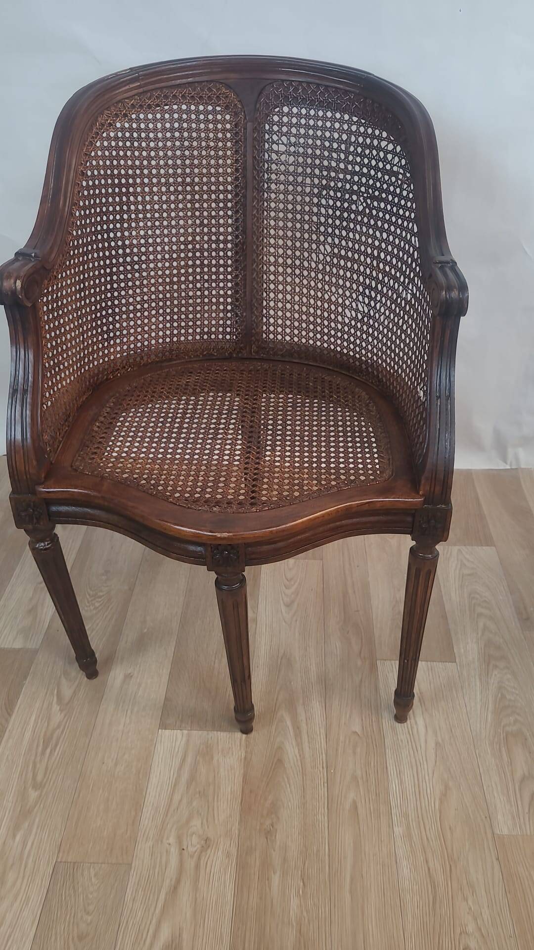 Carved wooden cane armchair – Louis XVI style