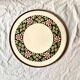 Antique ceramic trivet - floral decoration