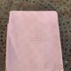 Duo set, consisting of two large pink-dyed cotton and linen towels, embroidered, TK monograms