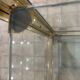 Large exhibition window in gilded brass 20th century period