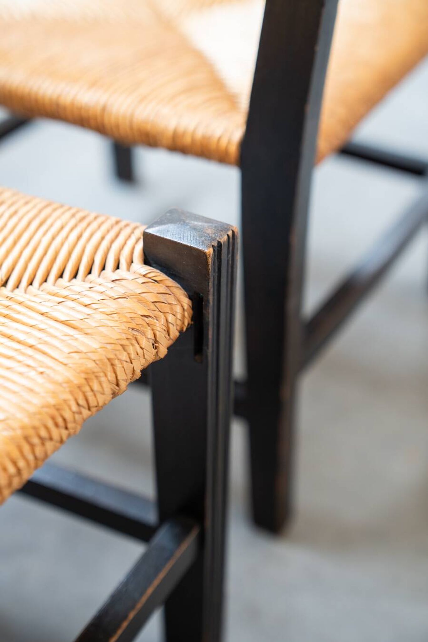 2 low bedroom chairs in hand-woven rice straw, 1950s/1960s