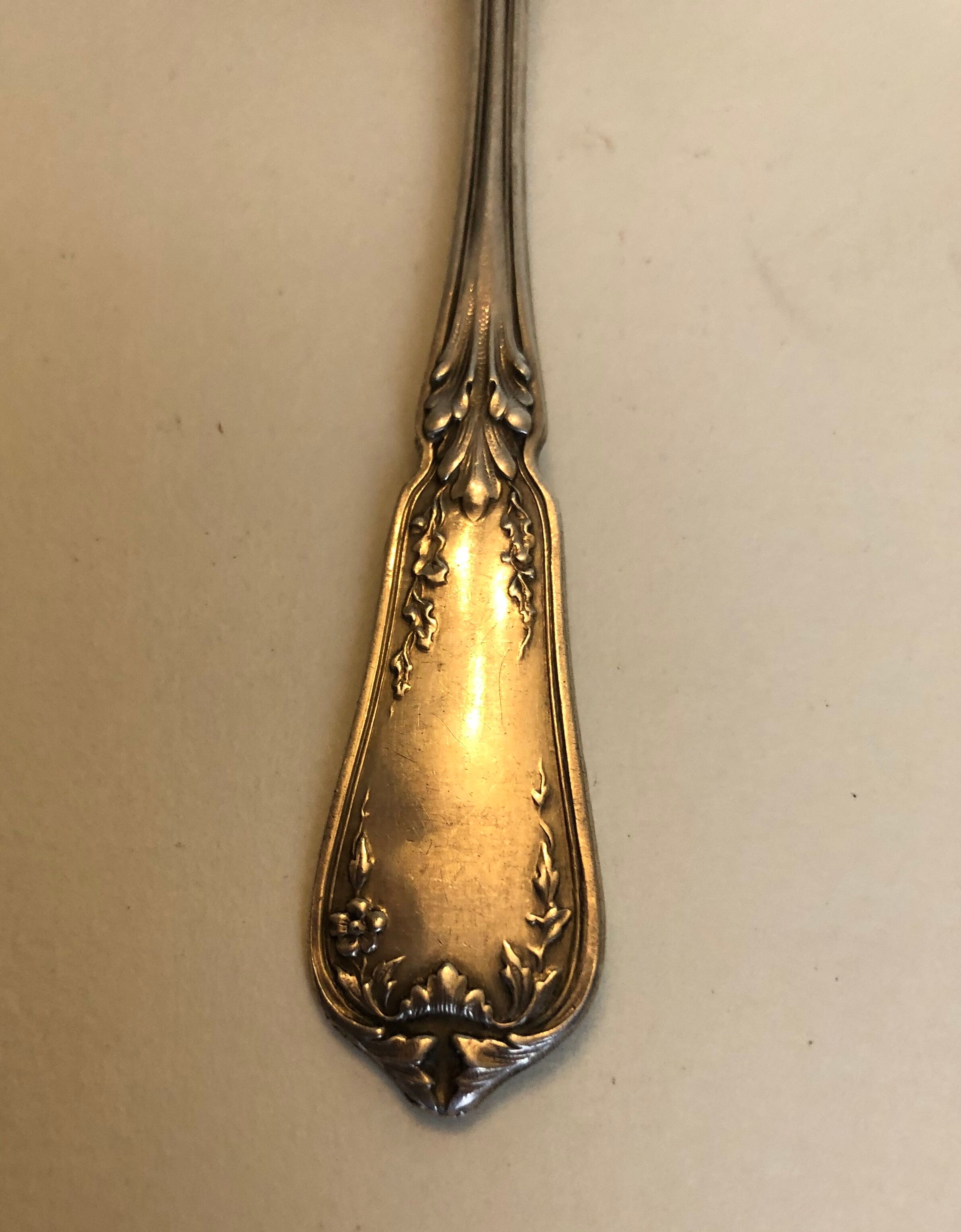 Silver sprinkler spoon