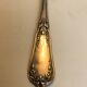 Silver sprinkler spoon