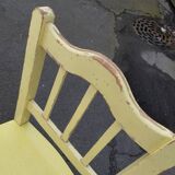 Pair of wooden and yellow formica chairs