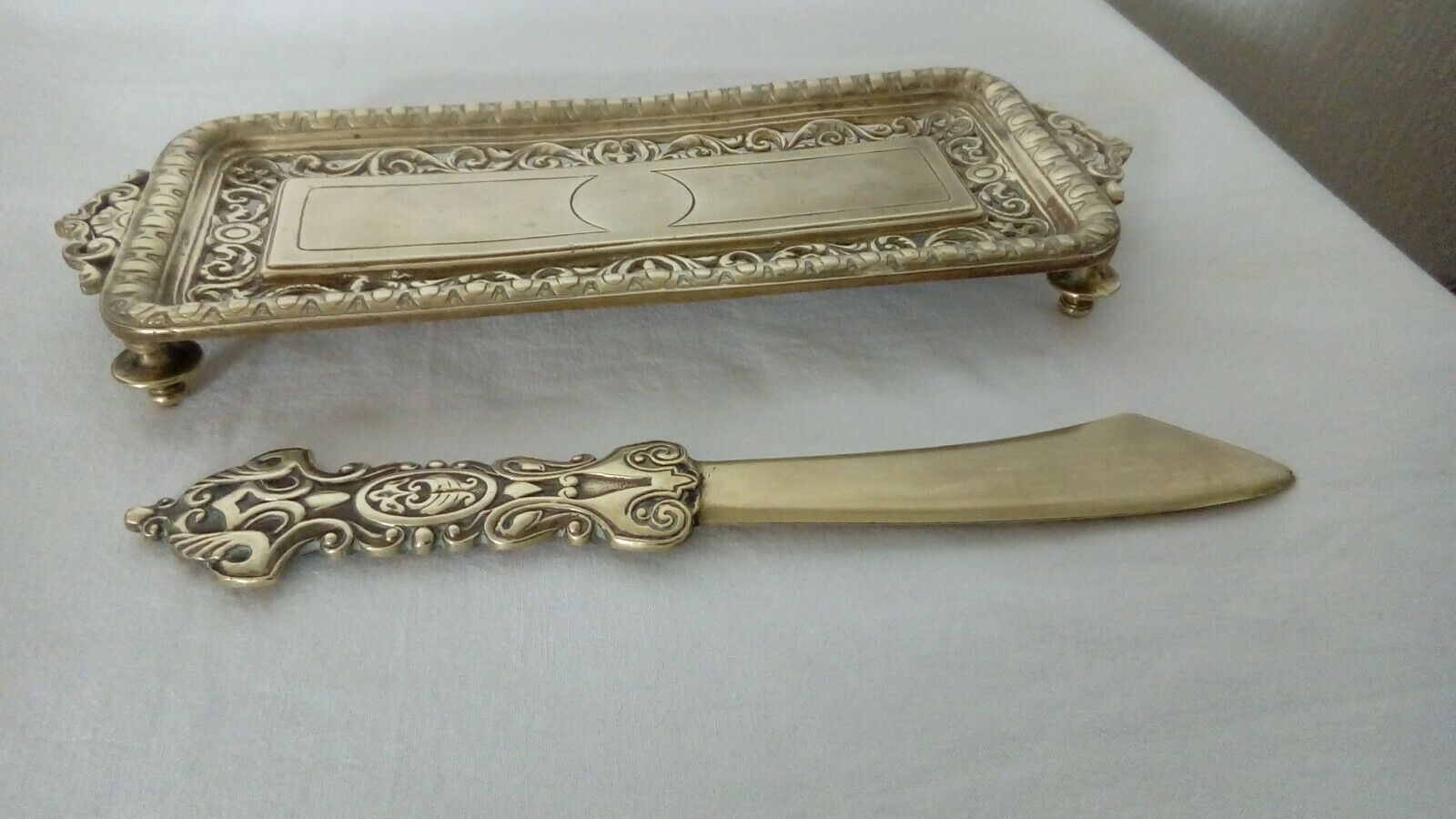 Bronze paper cut and its empty art nouveau pocket resting place late 19th