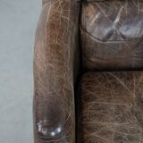 Very comfortable vintage cow leather armchair with beautiful colours