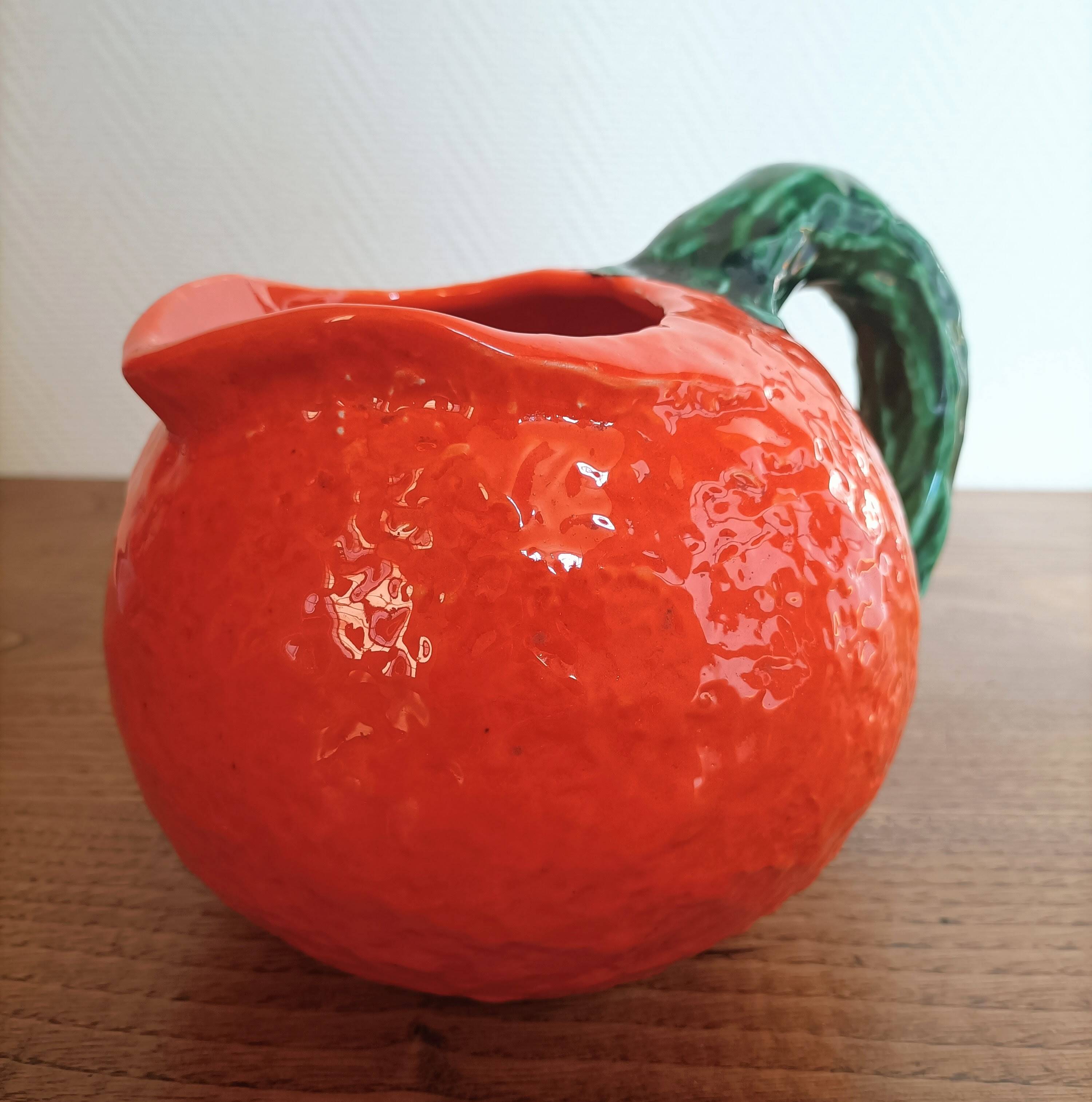 Orange pitcher in Corsican slip