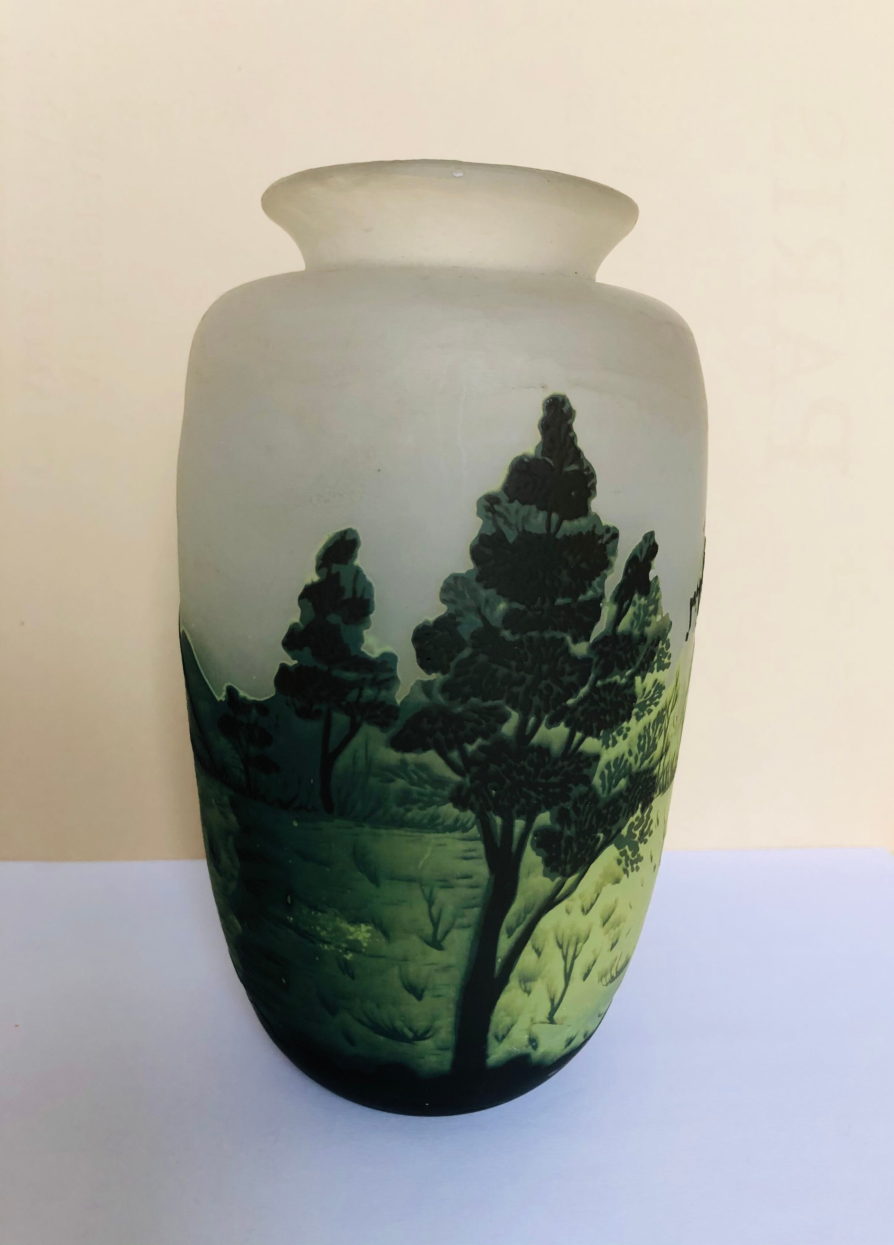 Multilayered glass vase engraved with acid