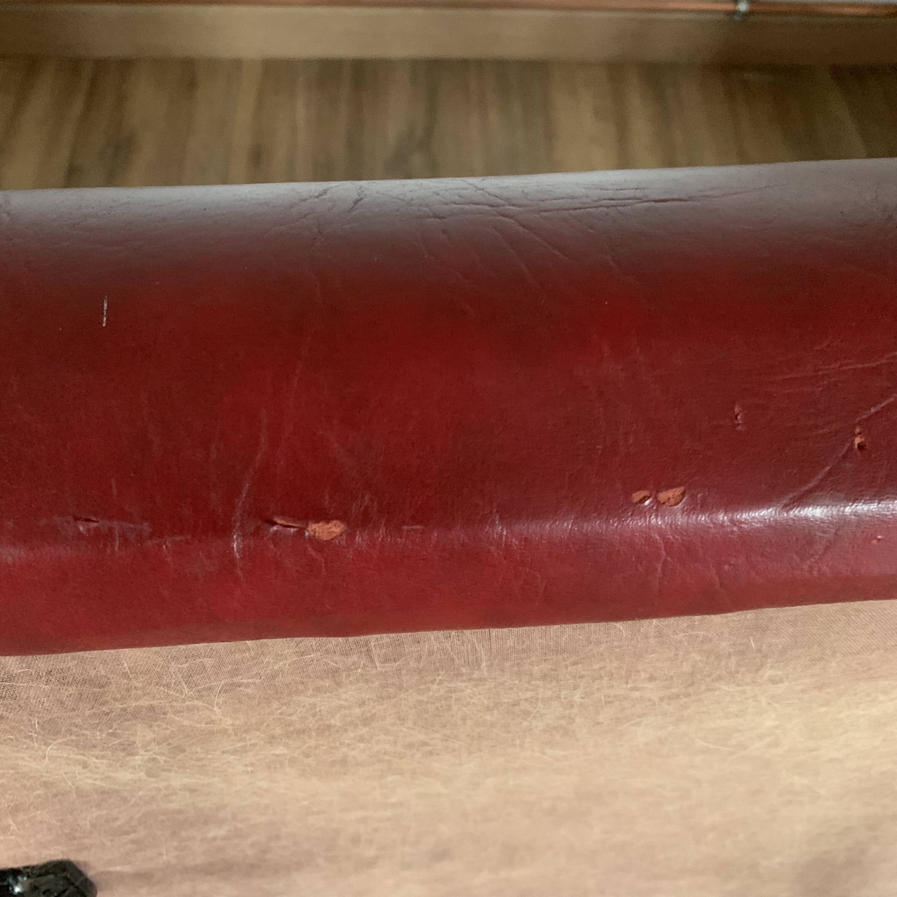 Pair of vintage burgundy red armchairs