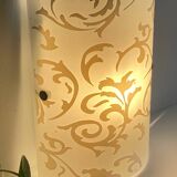 Polished and screen-printed glass sconce by eglo