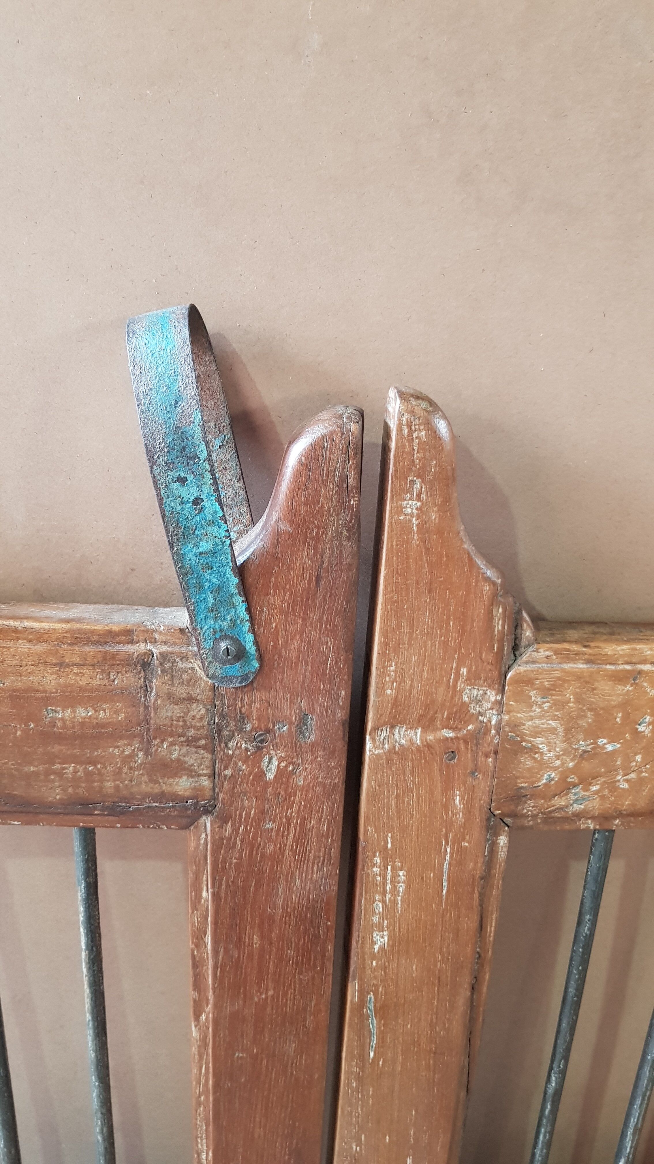 Old Burmese teak gate with openwork wrought iron panels