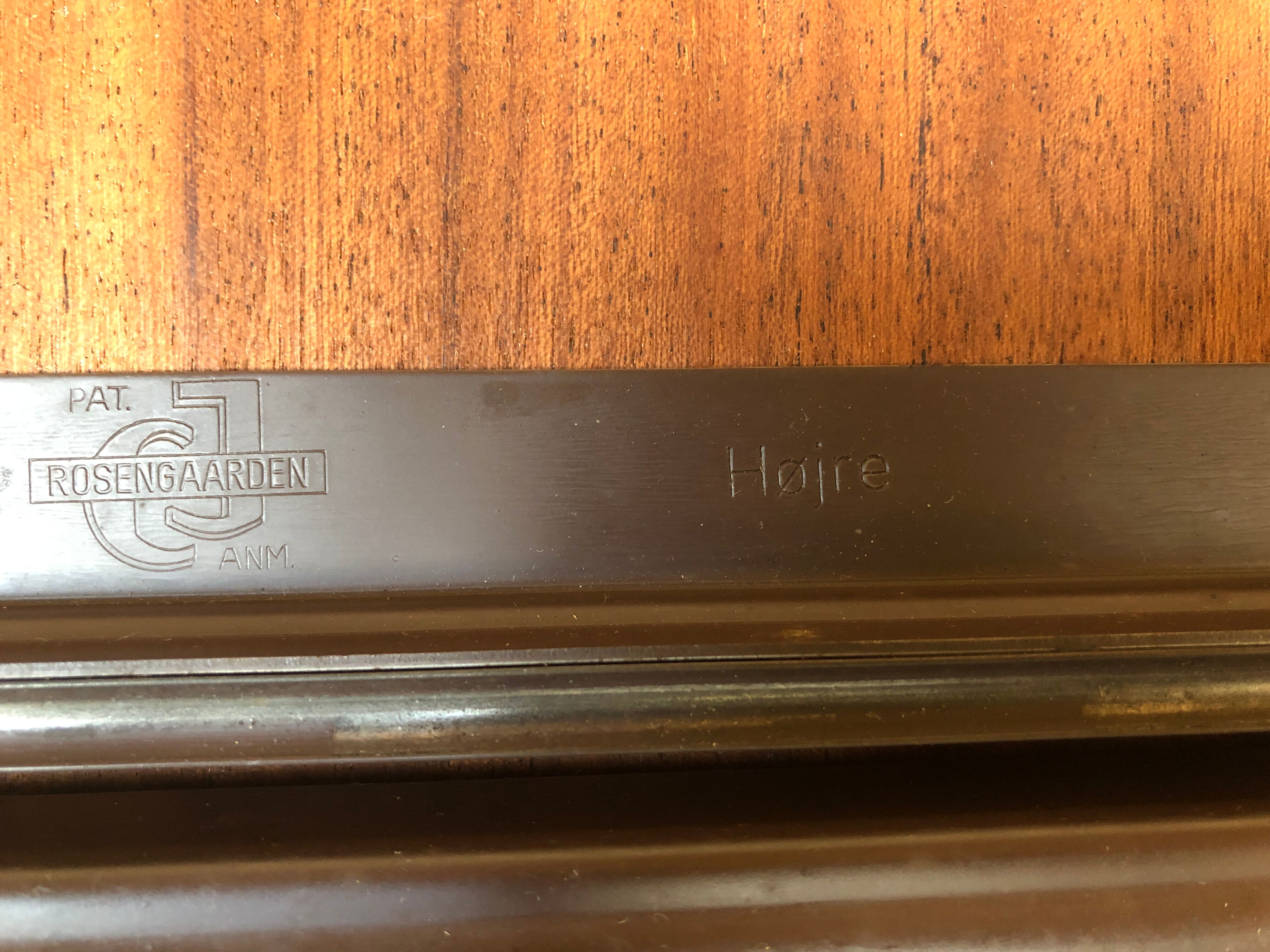 Expandable Scandinavian rosewood dining table by CJ Rosengaarden, circa 60's