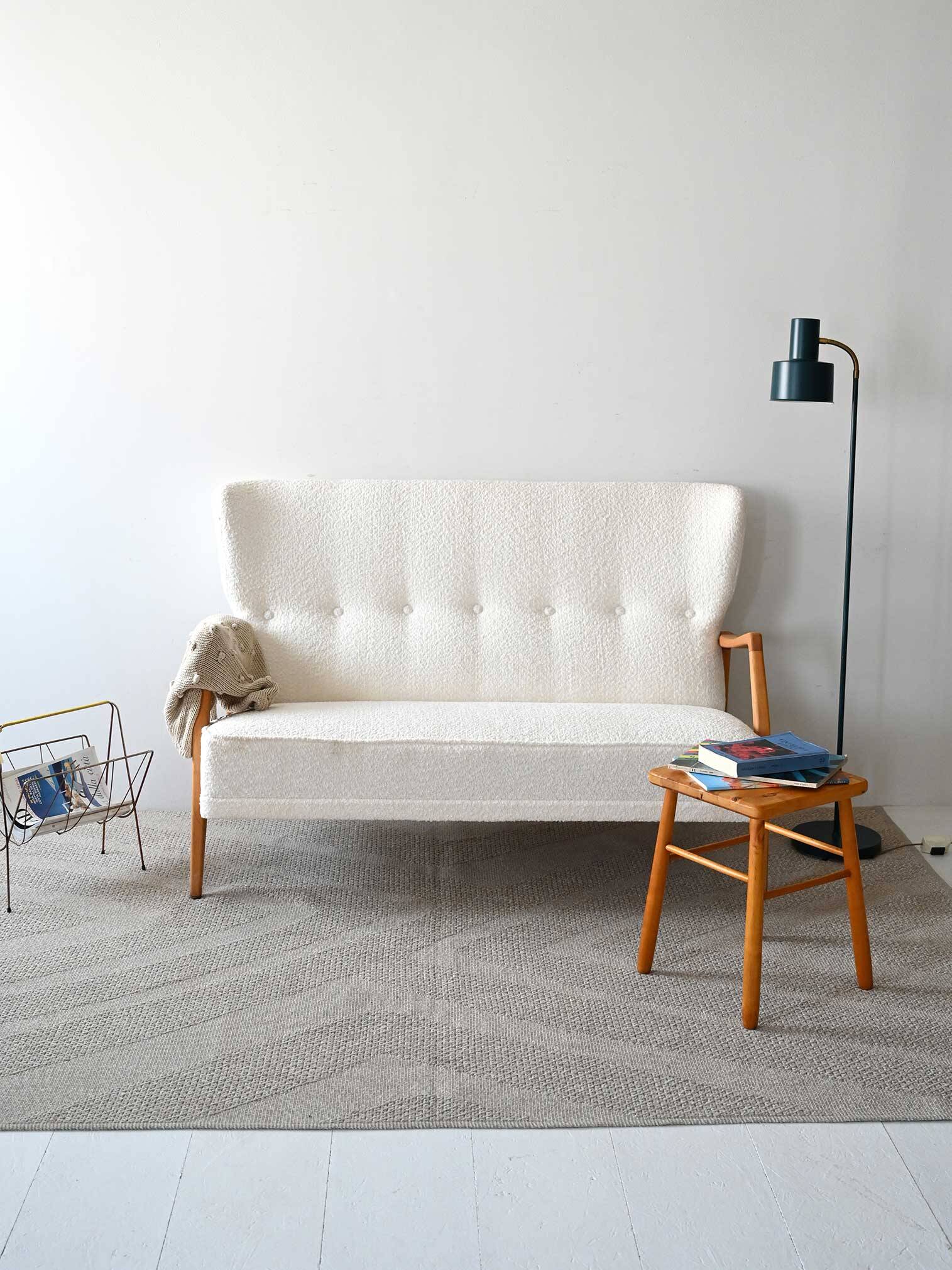 Vintage Scandinavian sofa with faux lambskin