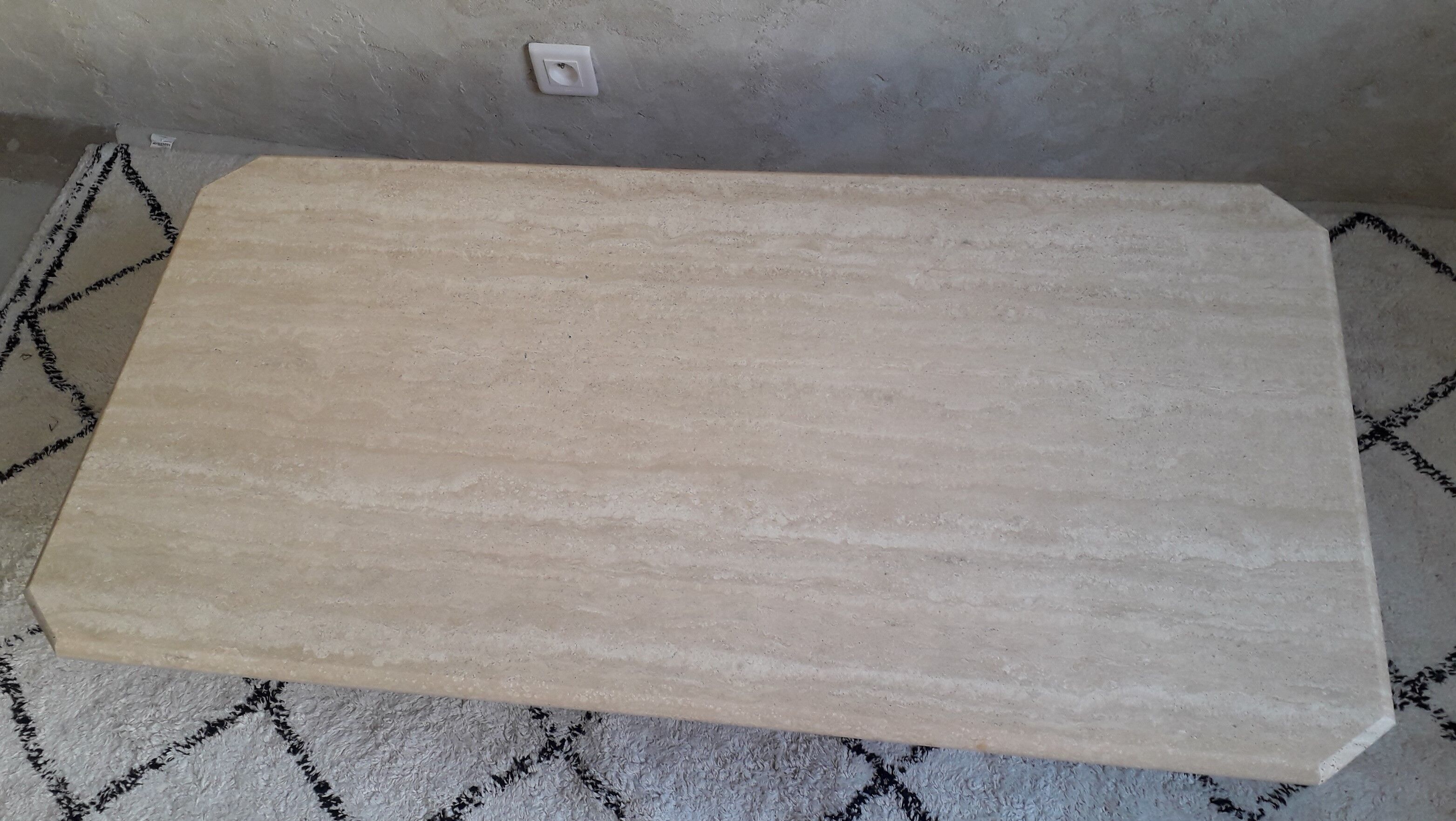 Coffee table in travertine