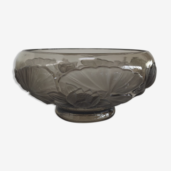 Molded smoked glass cup decorated with lotus flowers