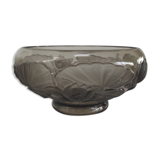 Molded smoked glass cup decorated with lotus flowers