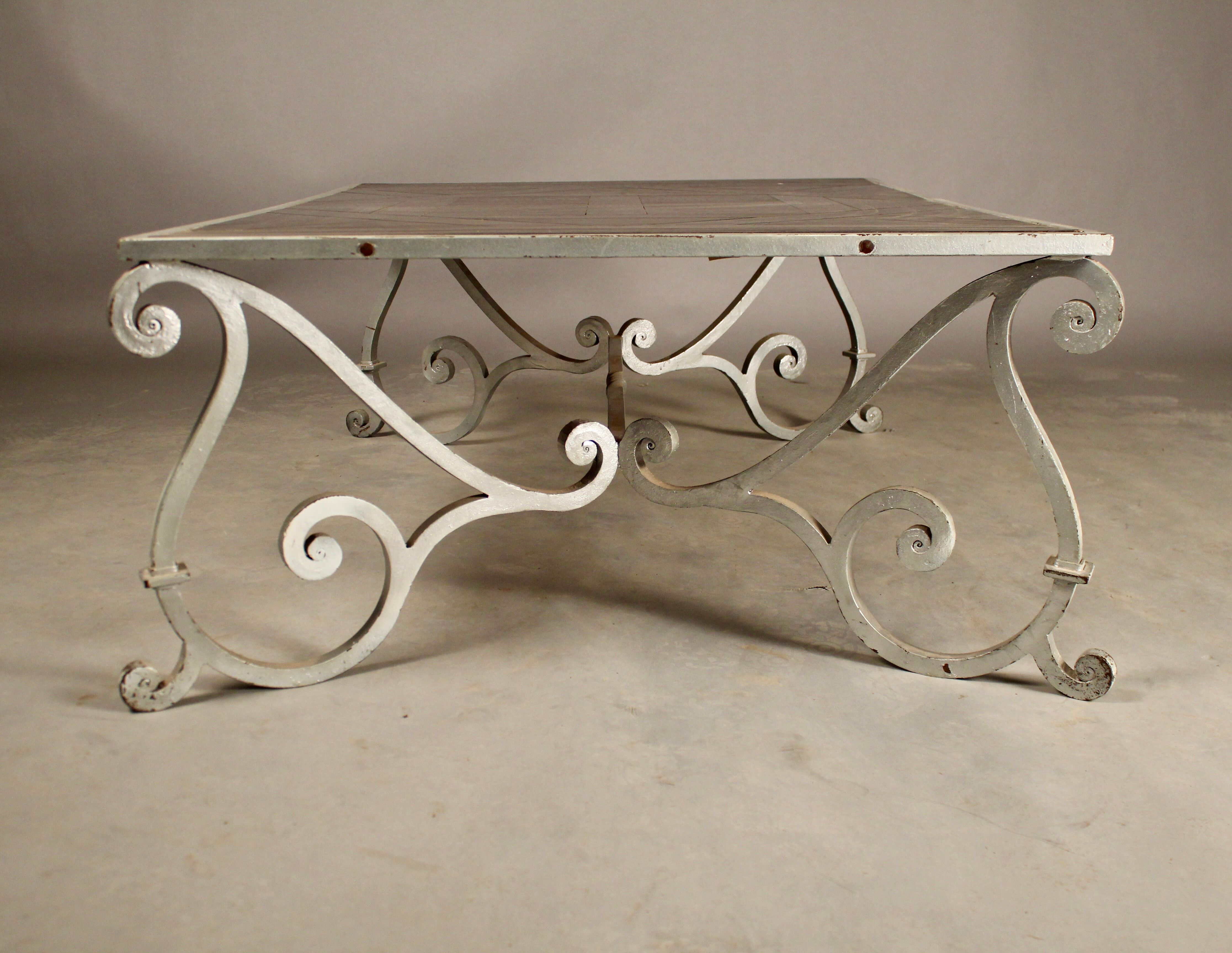 Coffee table on parquet wrought iron