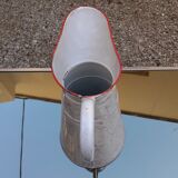 Enamelled sheet metal broc