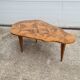 Vintage art deco coffee table with geometric marquetry