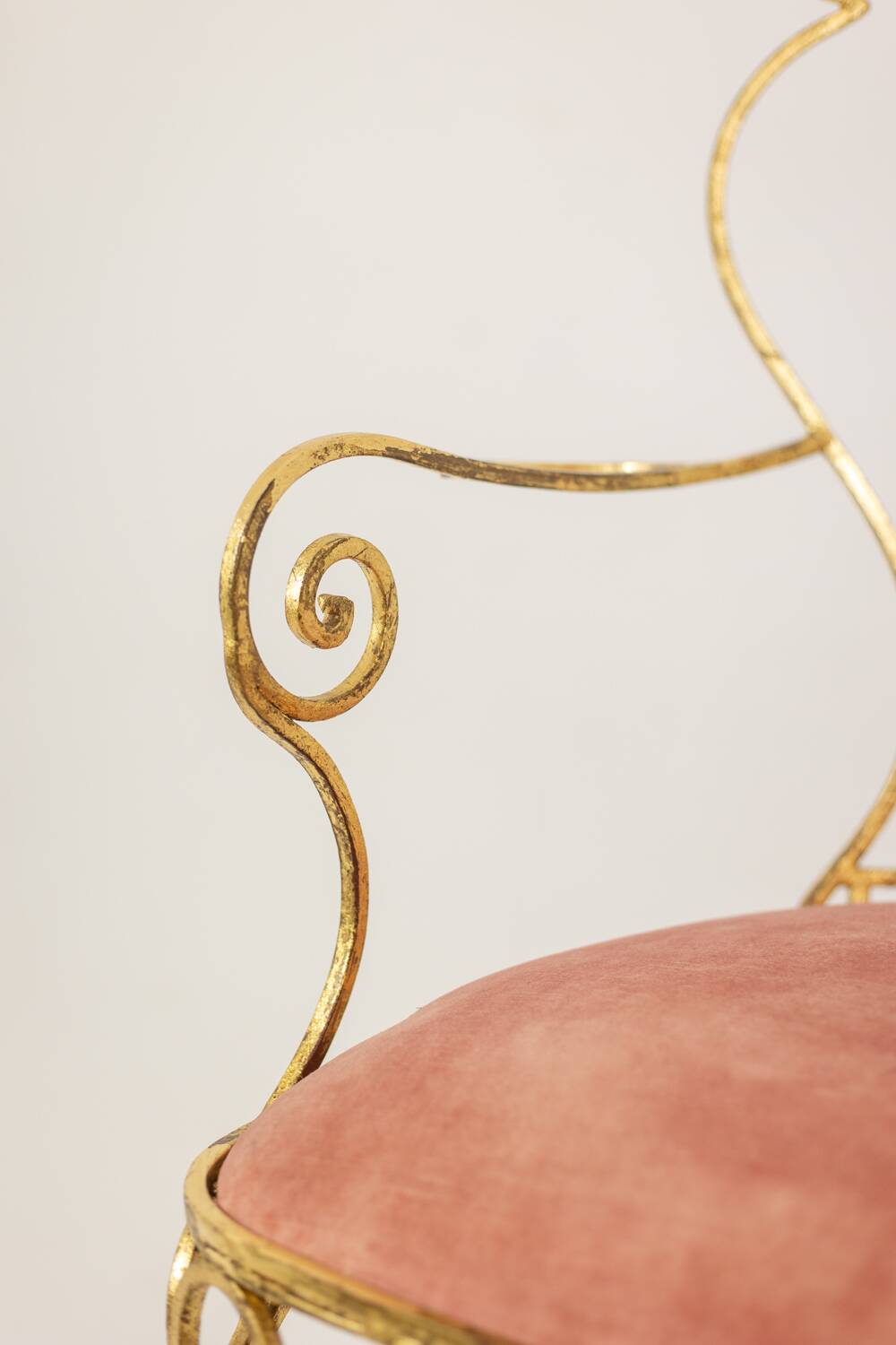 Pair of wrought iron and gilded armchairs, circa 1990