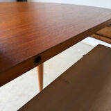 Scandinavian design extendable round table in teak, Danish manufacture.