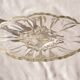 Oval glass fruit bowl on a stand.