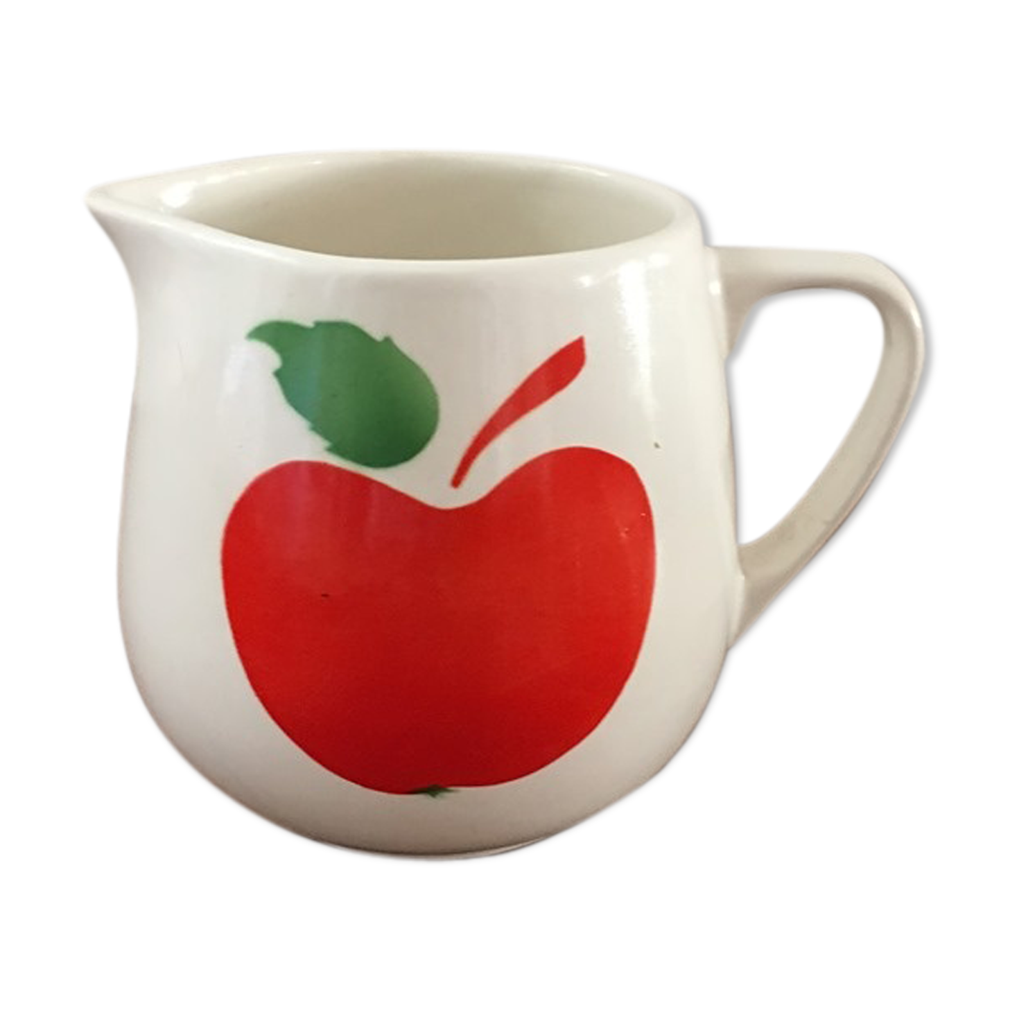 Vintage pitcher with apple decoration.
