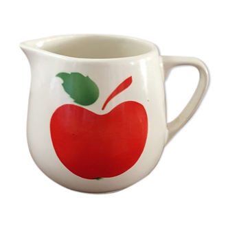 Vintage pitcher with apple decoration.