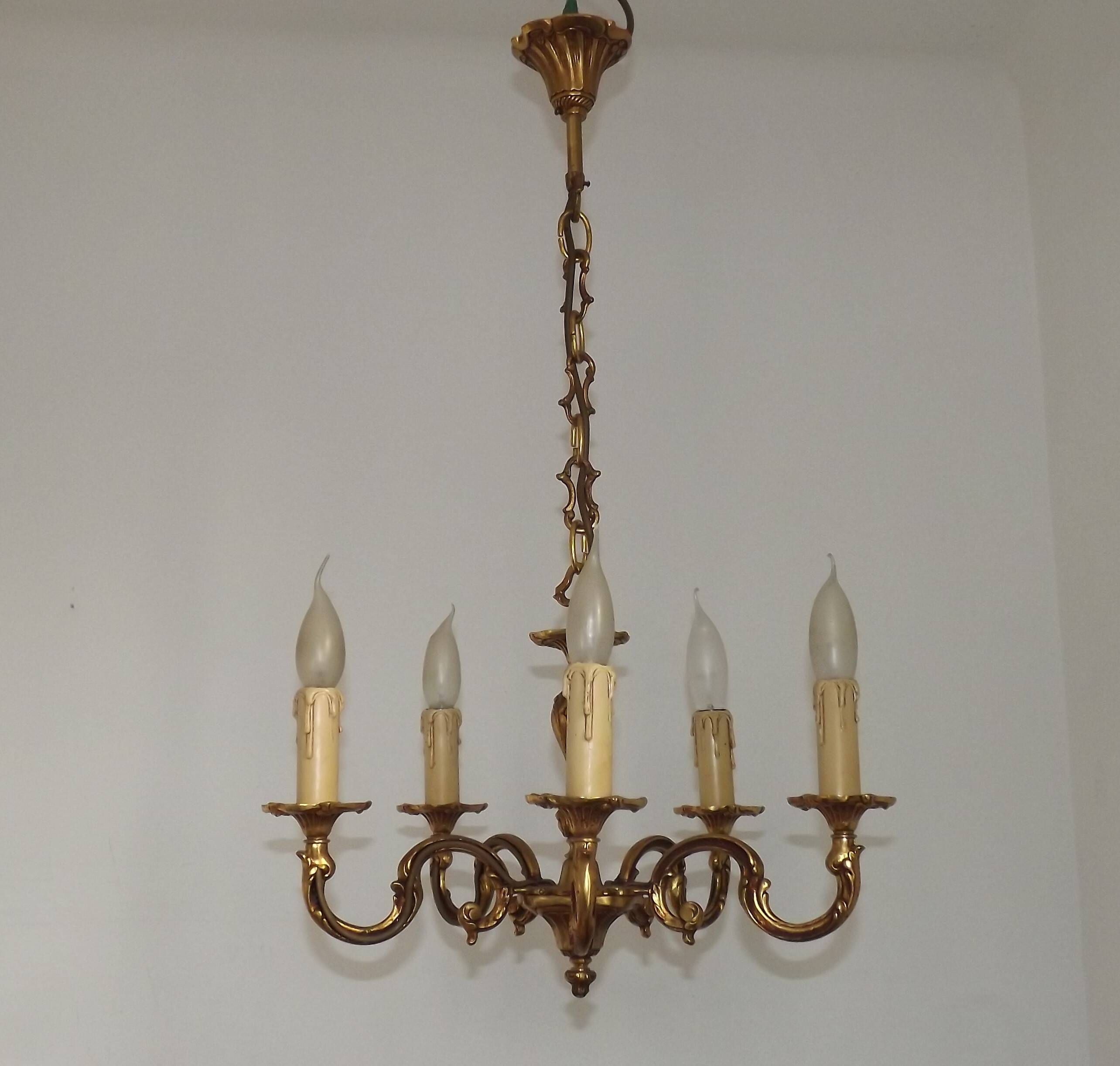 Vintage French traditional style bronze chandelier with 5 lights featuring acanthus leaf details.
