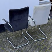 Paire de fauteuils en acier tubulaire