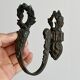Antique black patinated metal coat hook.