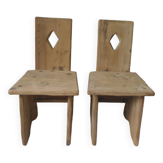 2 vintage brutalist style chairs in waxed finish pitch pine.