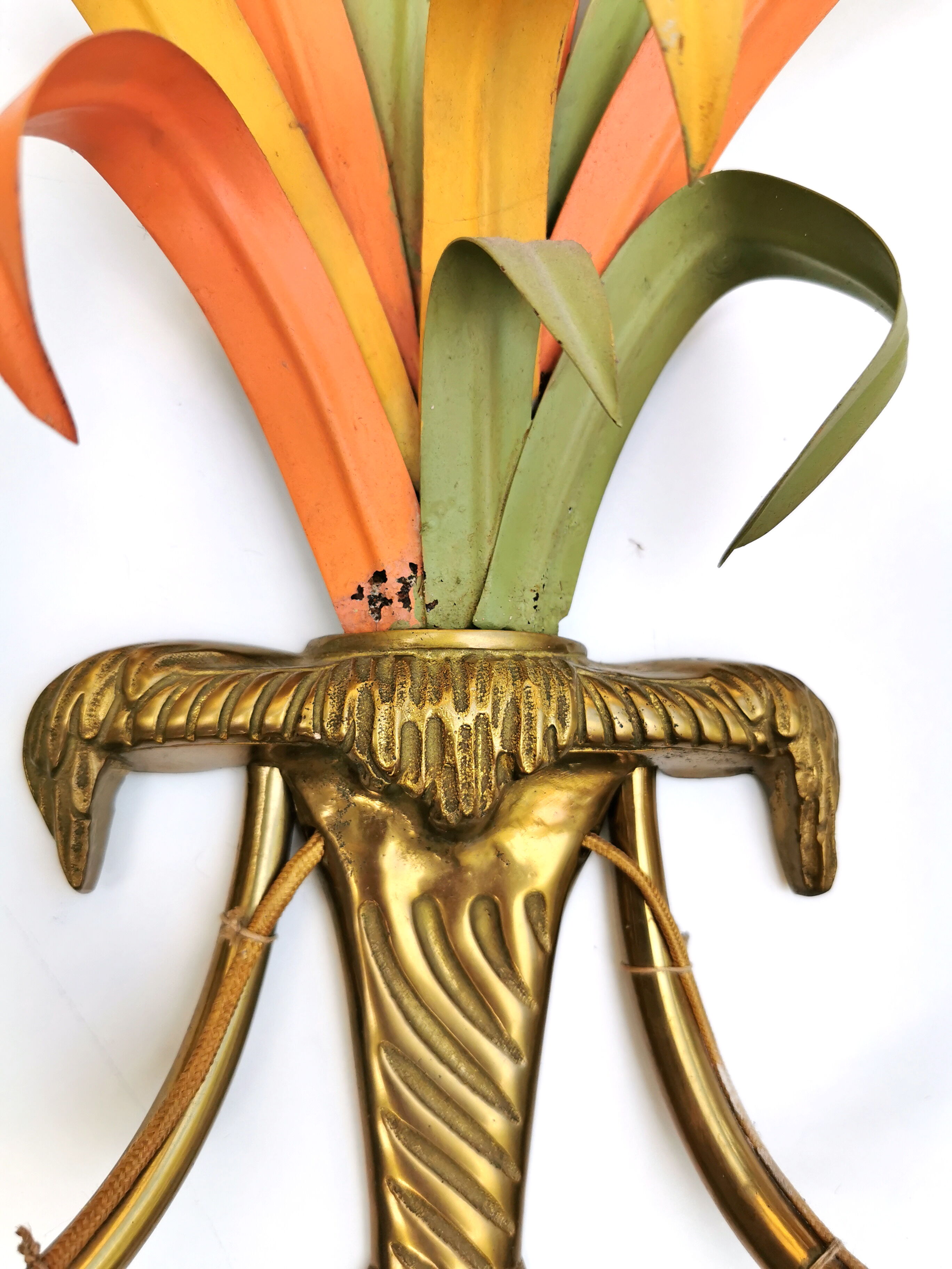 Maison Baguès, three bronze appliques decorated with camel heads and palm leaves