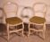 2 straw-seated chairs in polychrome wood