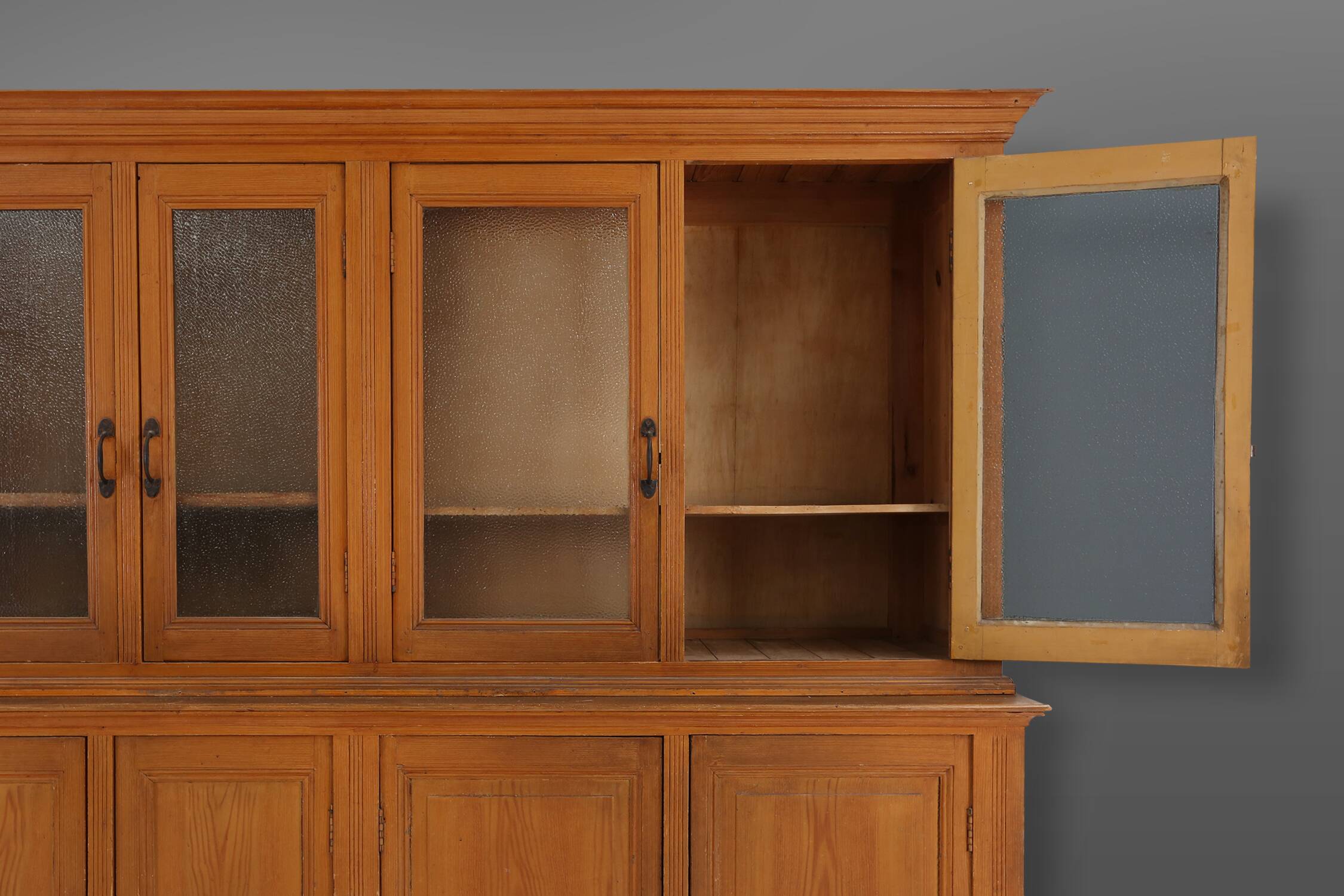 Impressive 12 doors monastery or display cabinet in pine, Belgium, 1890