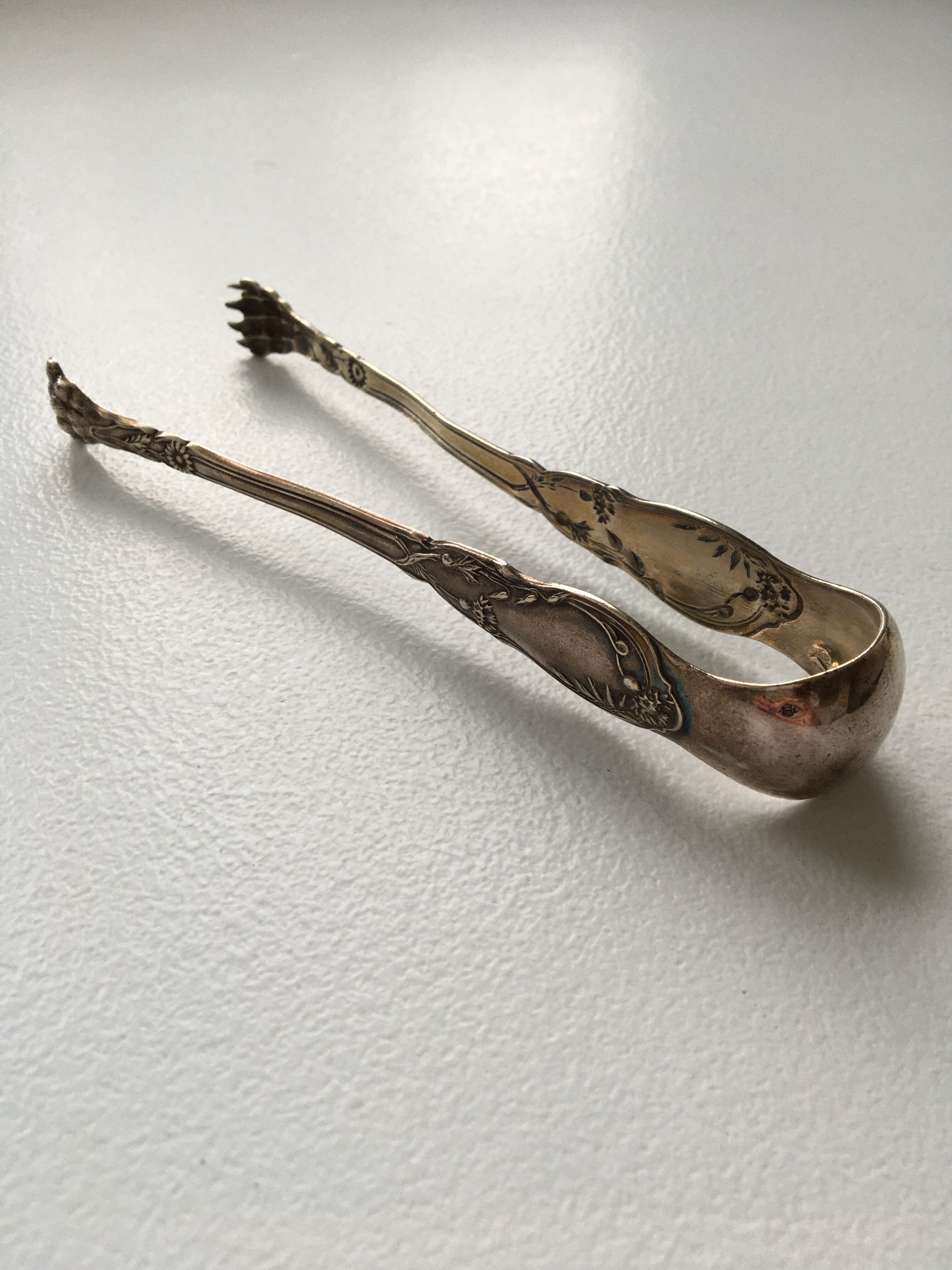Pince à sucre en métal argenté
