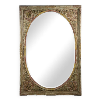 Large oval mirror with carved solid wood structure