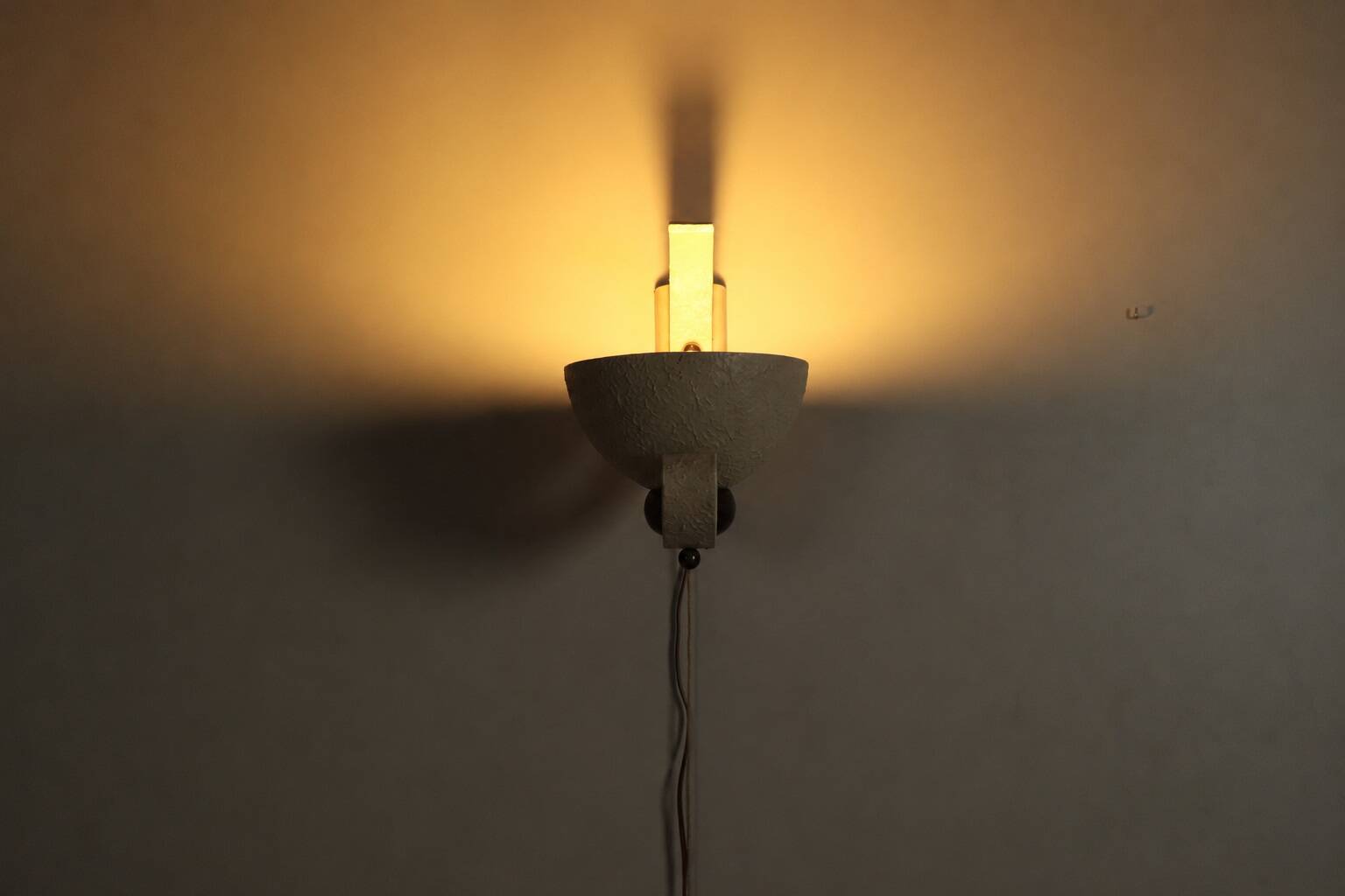 Pair of sculptural mid-century wall uplighters, circa 1950