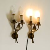 A pair of mid-century modern brass wall lamps by Vereinigte Werkstätten