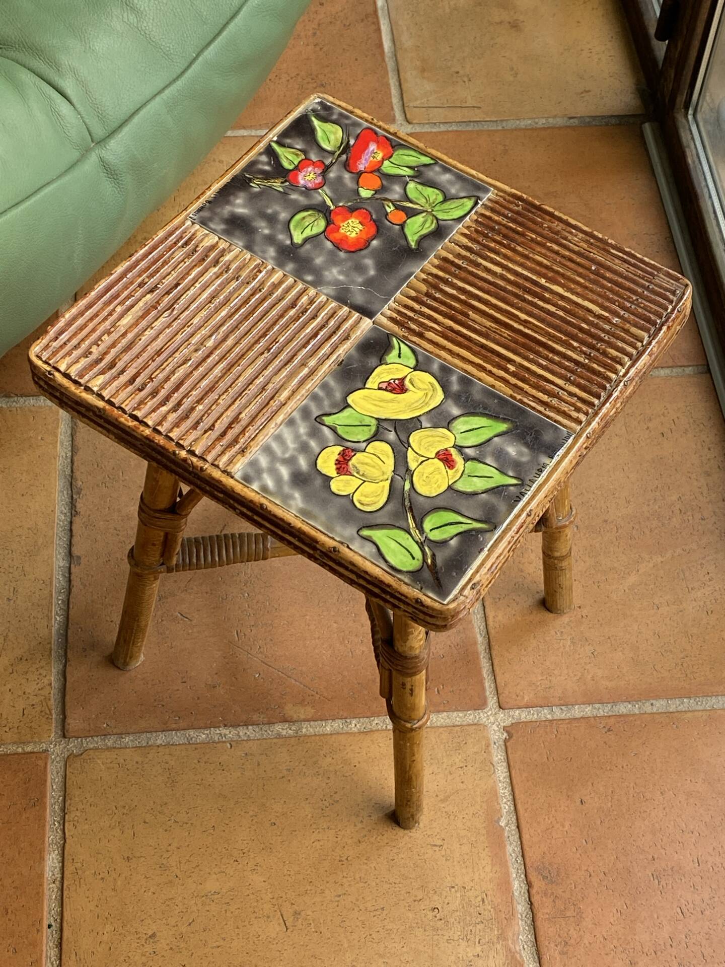 Rattan and ceramic coffee table attributed to Audoux and Minnet.