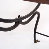 Curule armchair in wrought iron and leather