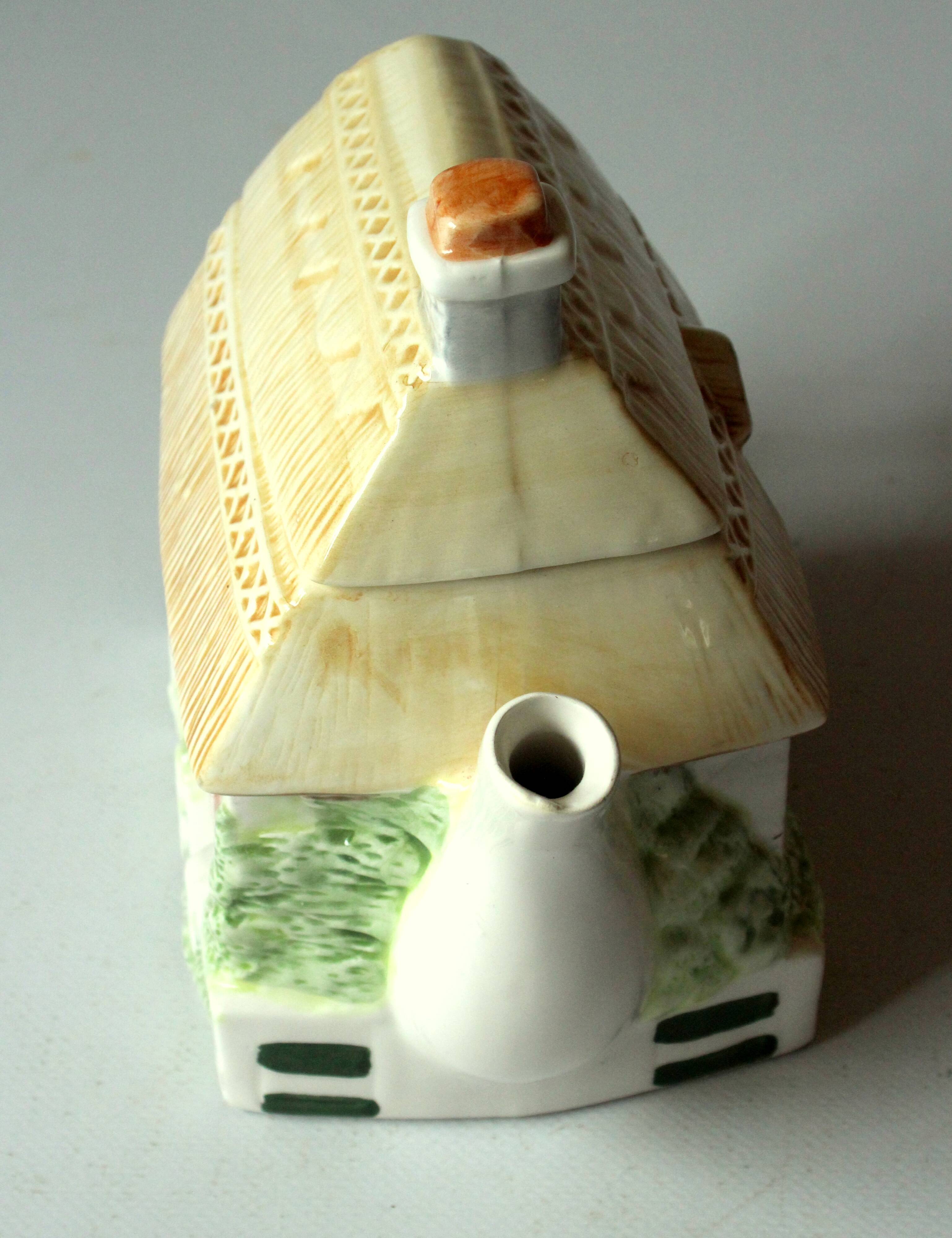 Handpainted fine ceramic design teapot "The Village"