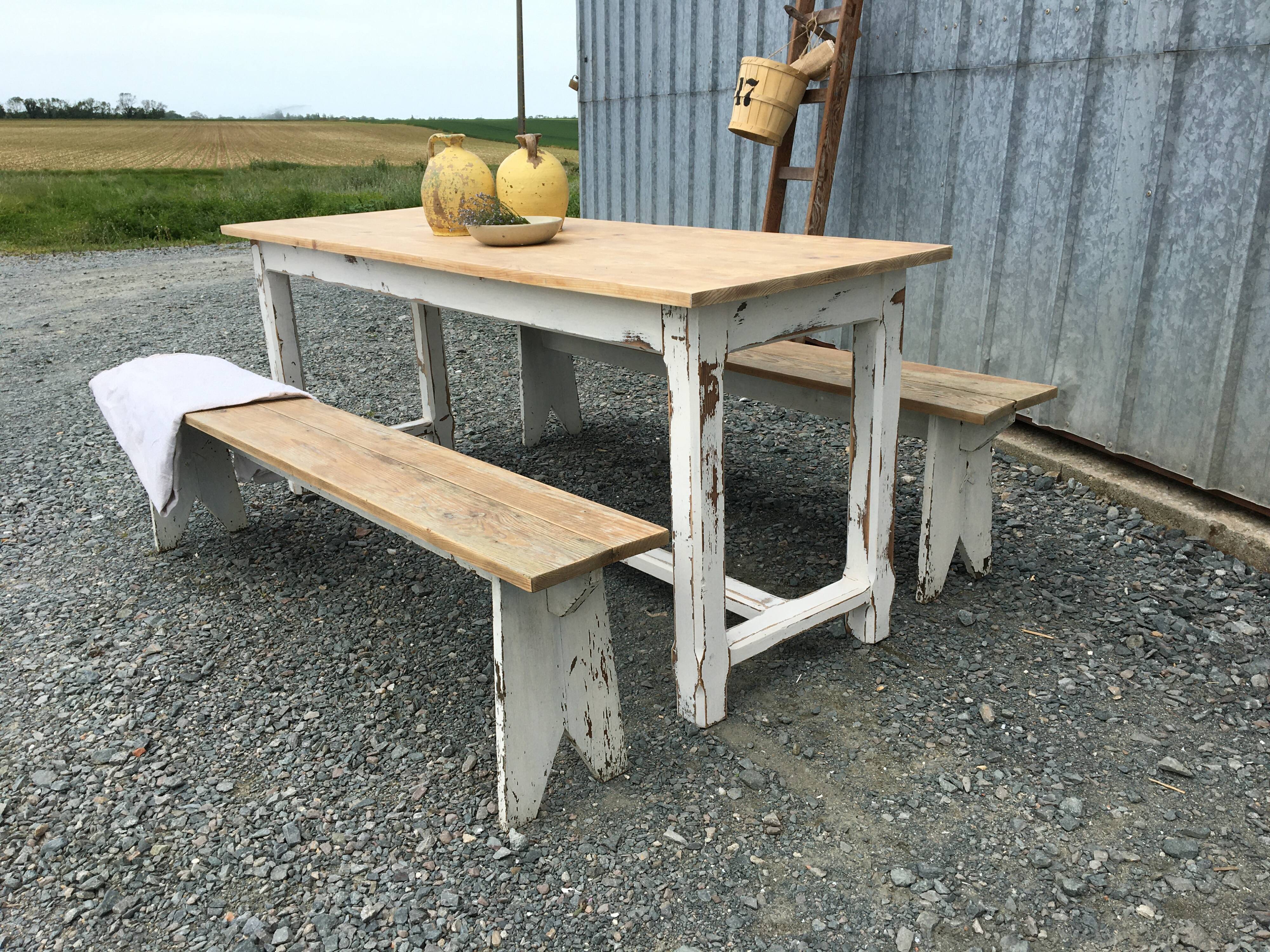 Farmhouse table with its two benches