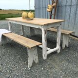 Farmhouse table with its two benches