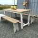 Farmhouse table with its two benches