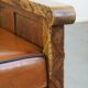 Fauteuil ancien en peau de mouton retapissée