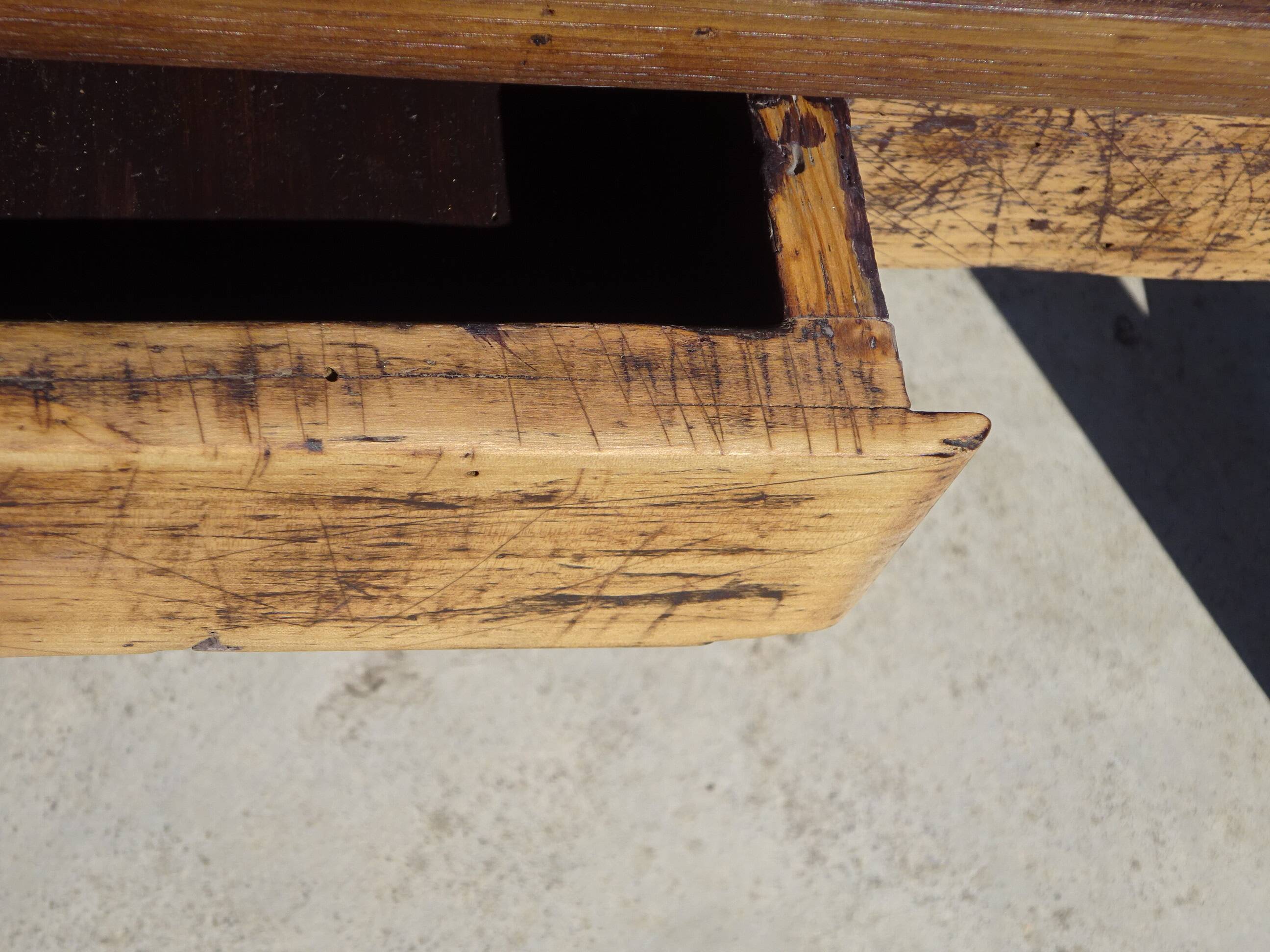 Old farmhouse table made entirely of restored solid oak.